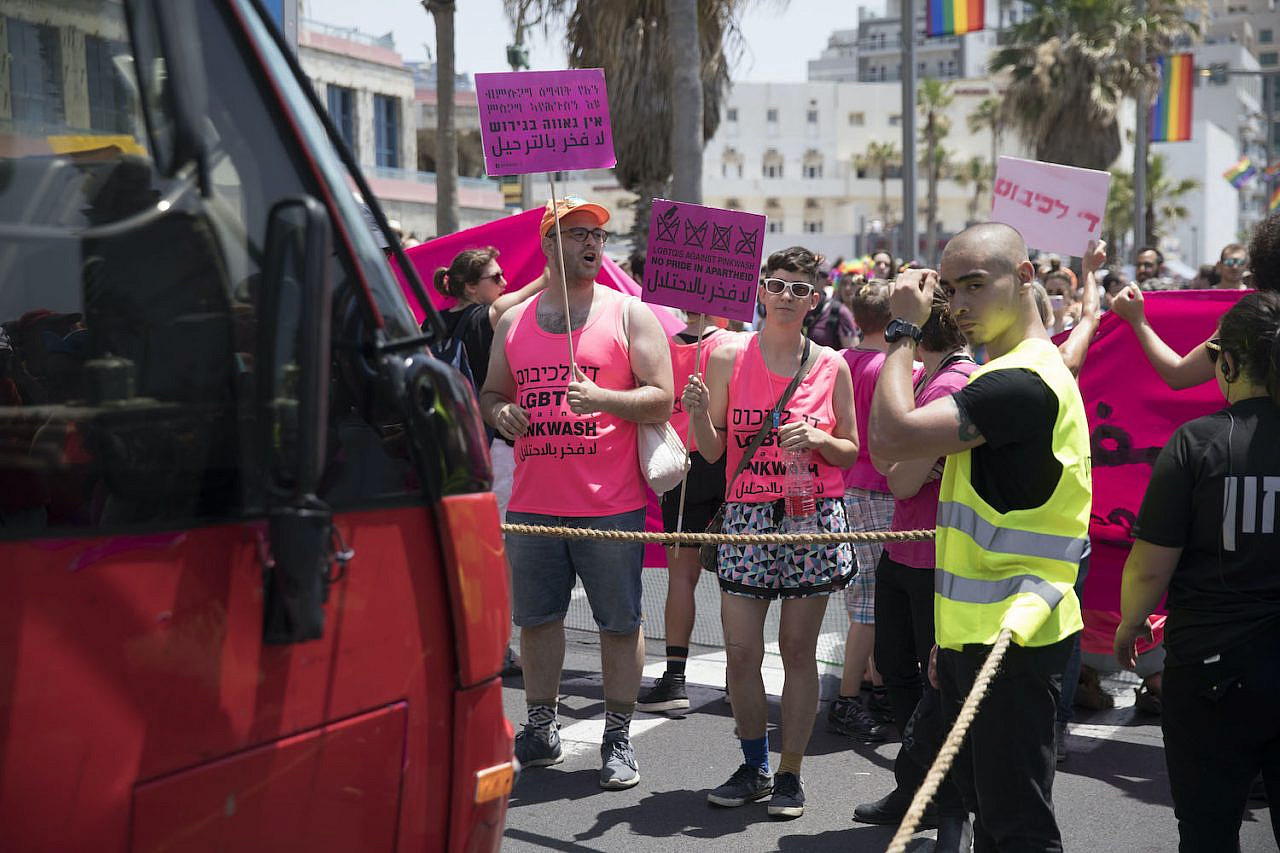 Israeli activists block the Tel Aviv Pride Parade to protest against pinkwashing, and in solidarity with the protests in Gaza, June 8, 2018. (Oren Ziv/Activestills)
