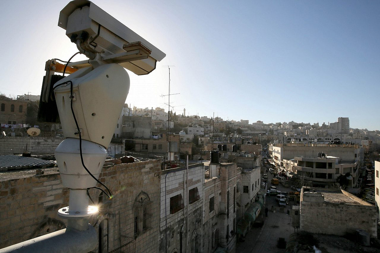 A security camera seen overlooking the West Bank city of Hebron, January 15, 2013. (Nati Shohat/Flash90)