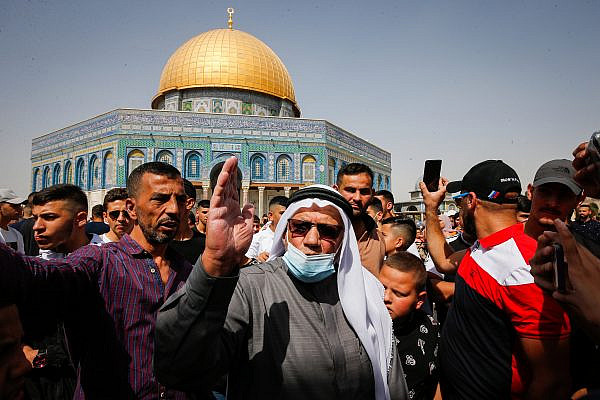 Palestinians protest against an Israeli judge's approval of 'quiet' Jewish prayer, at the Al Aqsa Mosque, in Jerusalem's Old City, October 8, 2021. (Jamal Awad/Flash90)