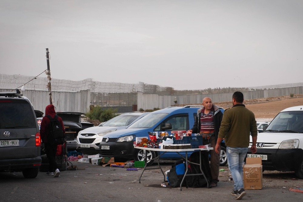 A Palestinian vendor seen near the Metar checkpoint, West Bank. (Rachel Shor)