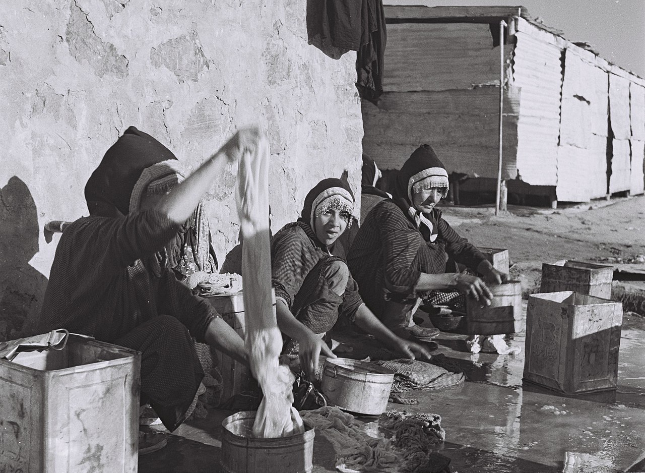 Yemenite immigrants do laundry in a 'ma'abara' (transit camp), 1949.
