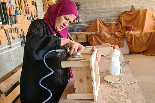Members of the Palestinian women's carpentry workshop Rweisat for Wood Art at work, in al-Walaja, West Bank. (Courtesy from their Facebook page)
