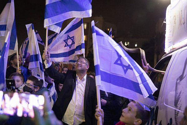 Far-right MK Itamar Ben-Gvir takes part in the 'flag march' in the city of Lydd, December 5, 2021. (Oren Ziv)