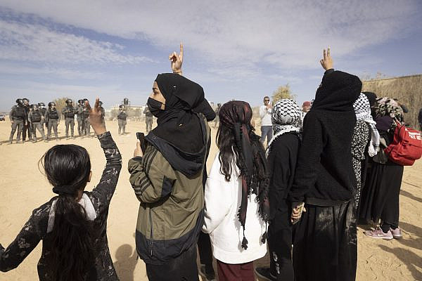 Bedouin women and girls protest Israel's afforestation and expropriation of their land, Sa’wa al-Atrash, Naqab, January 12, 2022. (Oren Ziv/Activestills.org)