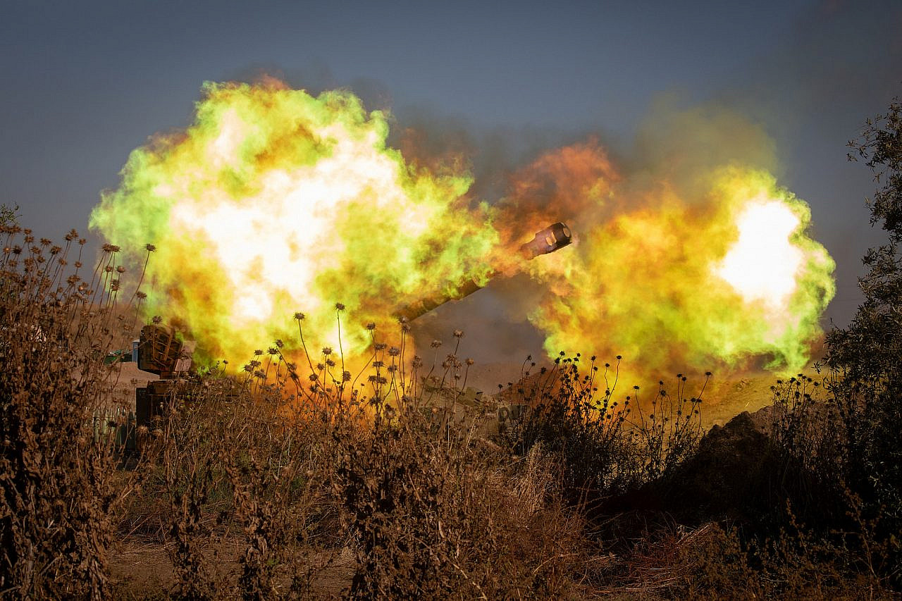 IDF artillery corps seen firing into Gaza, near the Israeli border with Gaza on May 19, 2021. (Olivier Fitoussi/Flash90)