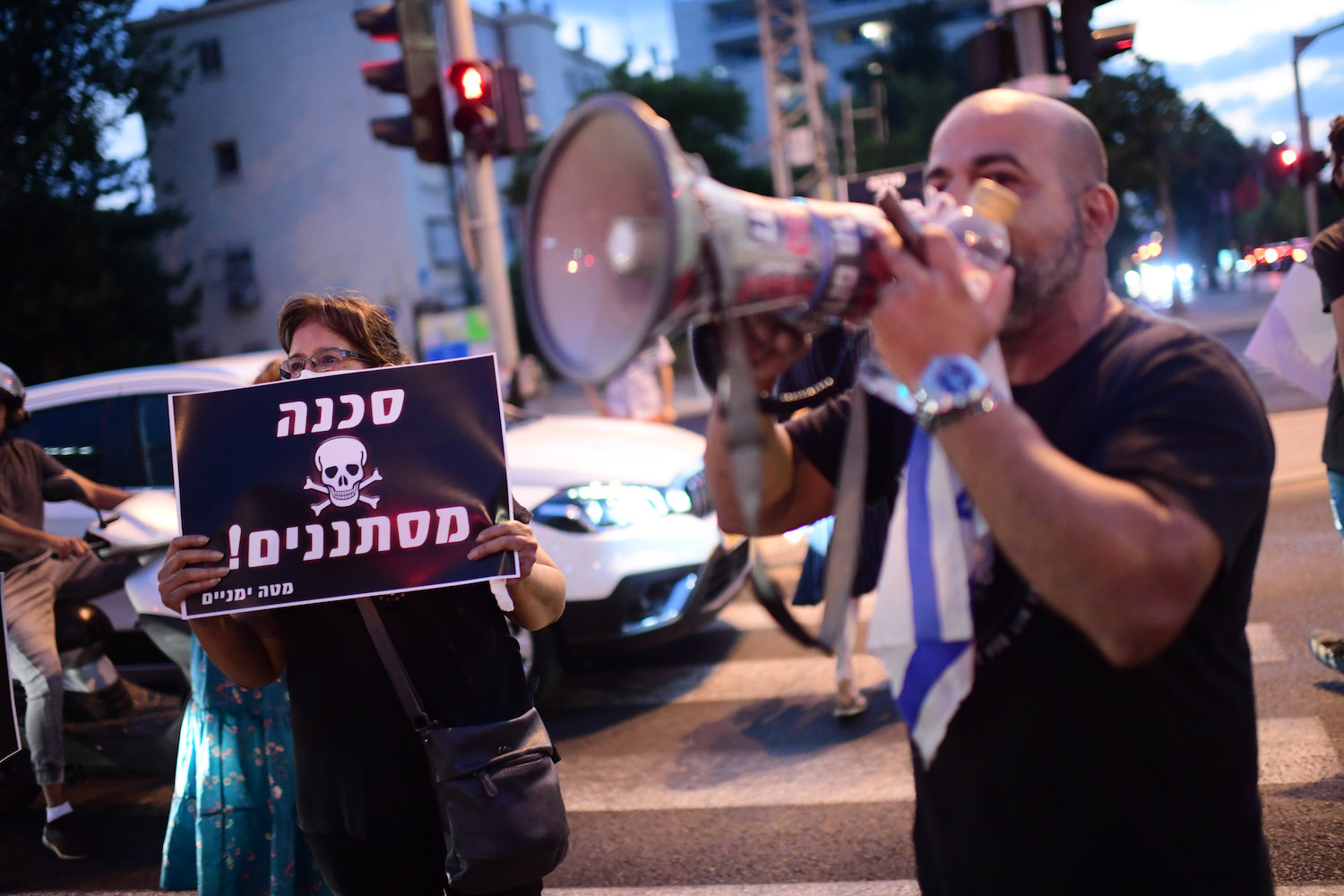 Residents of South Tel Aviv protest against the integration of children of asylum seekers and migrant workers in the neighborhood's education system, Tel Aviv, August 25, 2021. (Tomer Neuberg/Flash90)