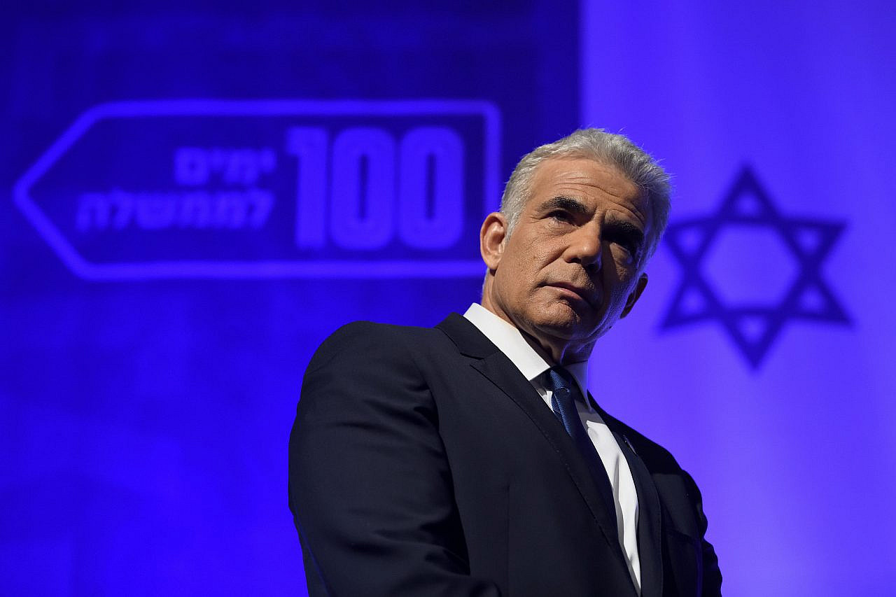 Israeli Foreign minister and Yesh Atid party chairman Yair Lapid speaks at a party conference marking 100 days since the formation of the new Israeli government, in Shefayim, September 22, 2021. (Gili Yaari/Flash90)