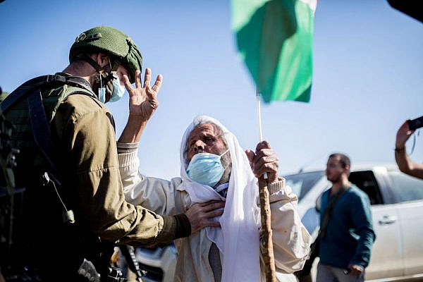 Haj Suleiman Hathaleen protesting in Masafer Yatta in the South Hebron Hills, West Bank. (Emily Glick)