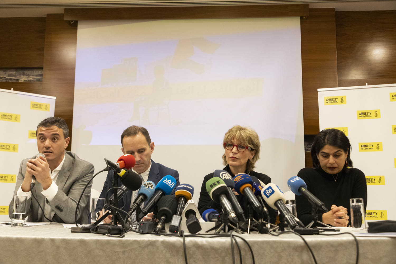 Members of Amnesty International, including Saleh Hijazi (left) hold a press conference in Jerusalem announcing the release of the organization's report on Israeli apartheid, February 1, 2022. (Oren Ziv)
