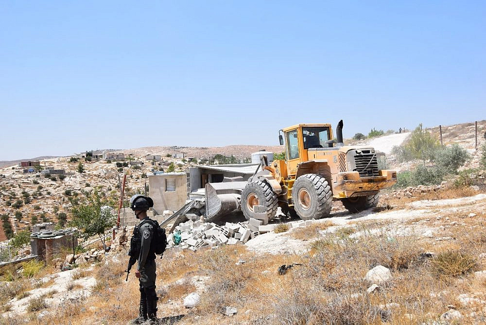 Israeli forces demolish a home in the village of Khalet al-Daba, South Hebron Hills, August 11, 2021.