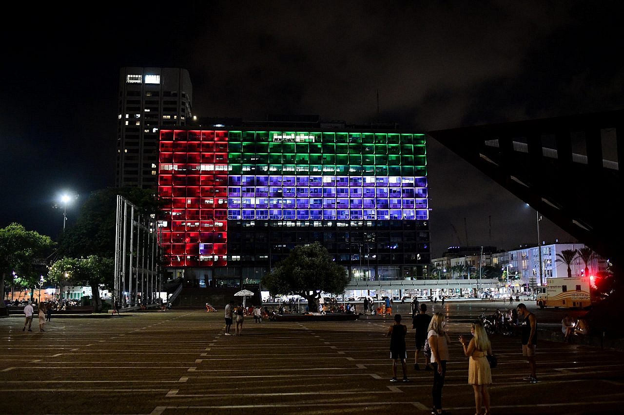 The Tel Aviv Municipality Building at the end of Rabin Square, is lit up in the colors of the flag of the United Arab Emirates, August 13, 2020. (Avhalom Sassoni/Flash90)