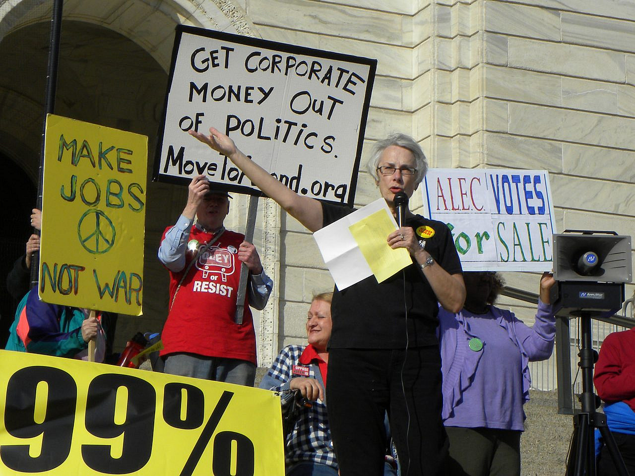 A demonstrator speaks at a protest against the American Legislative Exchange Council, St. Paul, Minnesota, March 13, 2012. (Fibonacci Blue/CC BY 2.0)