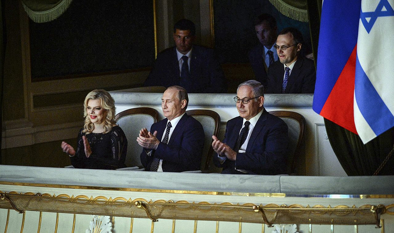 Former Prime Minister Benjamin Netanyahu with his wife Sara with Russian President Vladimir Putin at the Bolshoi Theatre in Moscow, June 7, 2016. (Haim Zach/GPO)