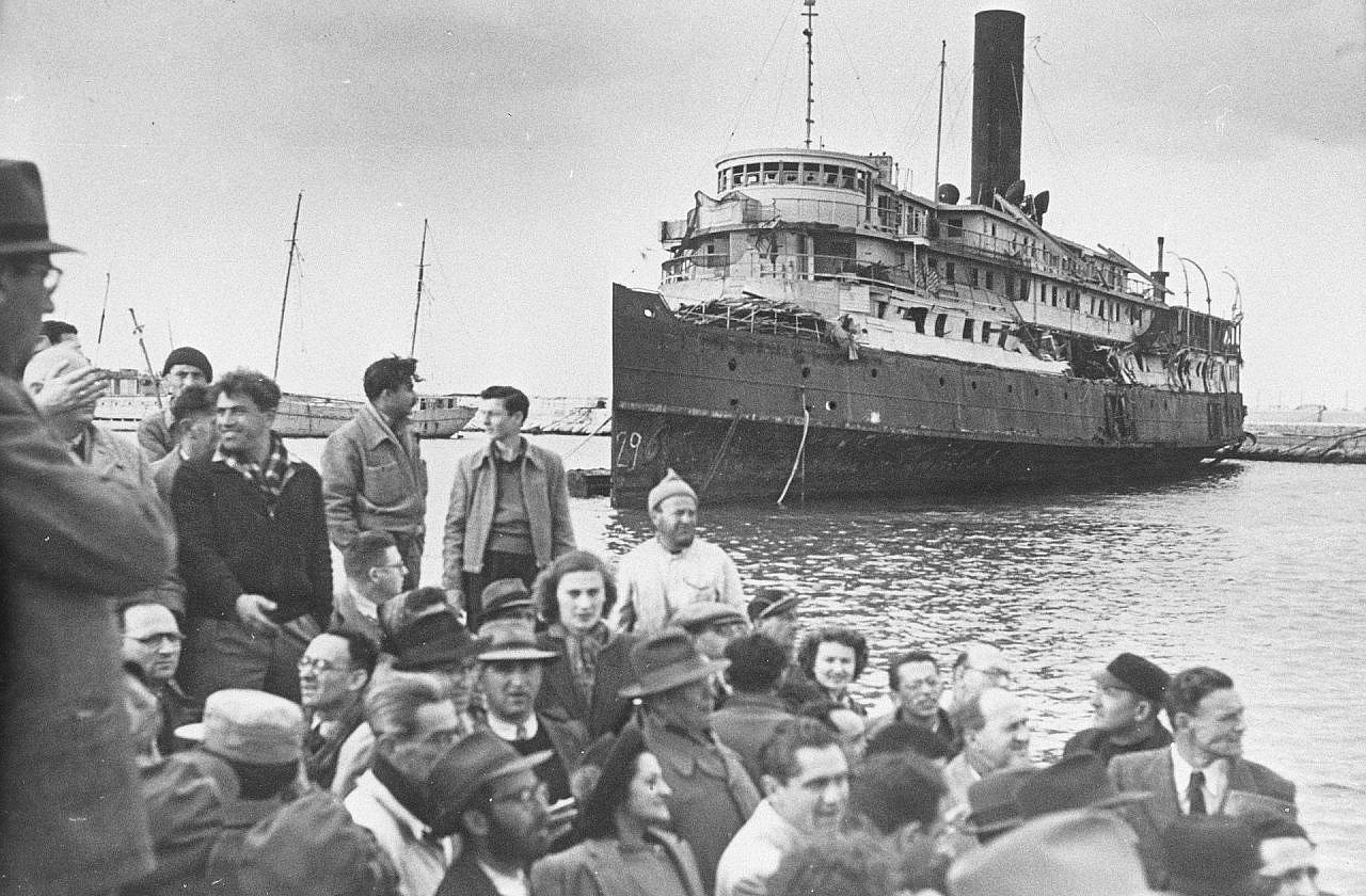 The SS Exodus, which carried 4,515 Jews from France to Palestine, seen docked at the Haifa port, July 18, 1947. (Palmach Archive)