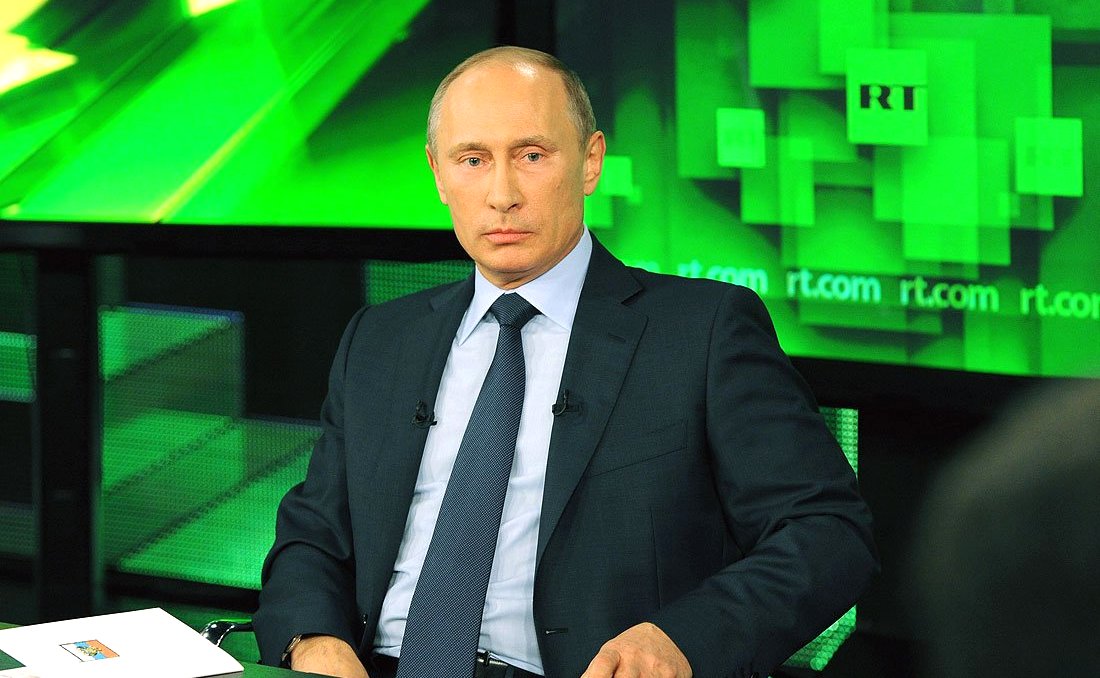 Russian president Vladimir Putin visiting the new Russia Today broadcasting center and meeting with the channel's leadership and correspondents, 2013. (Kremlin.ru/CC-BY-4.0)
