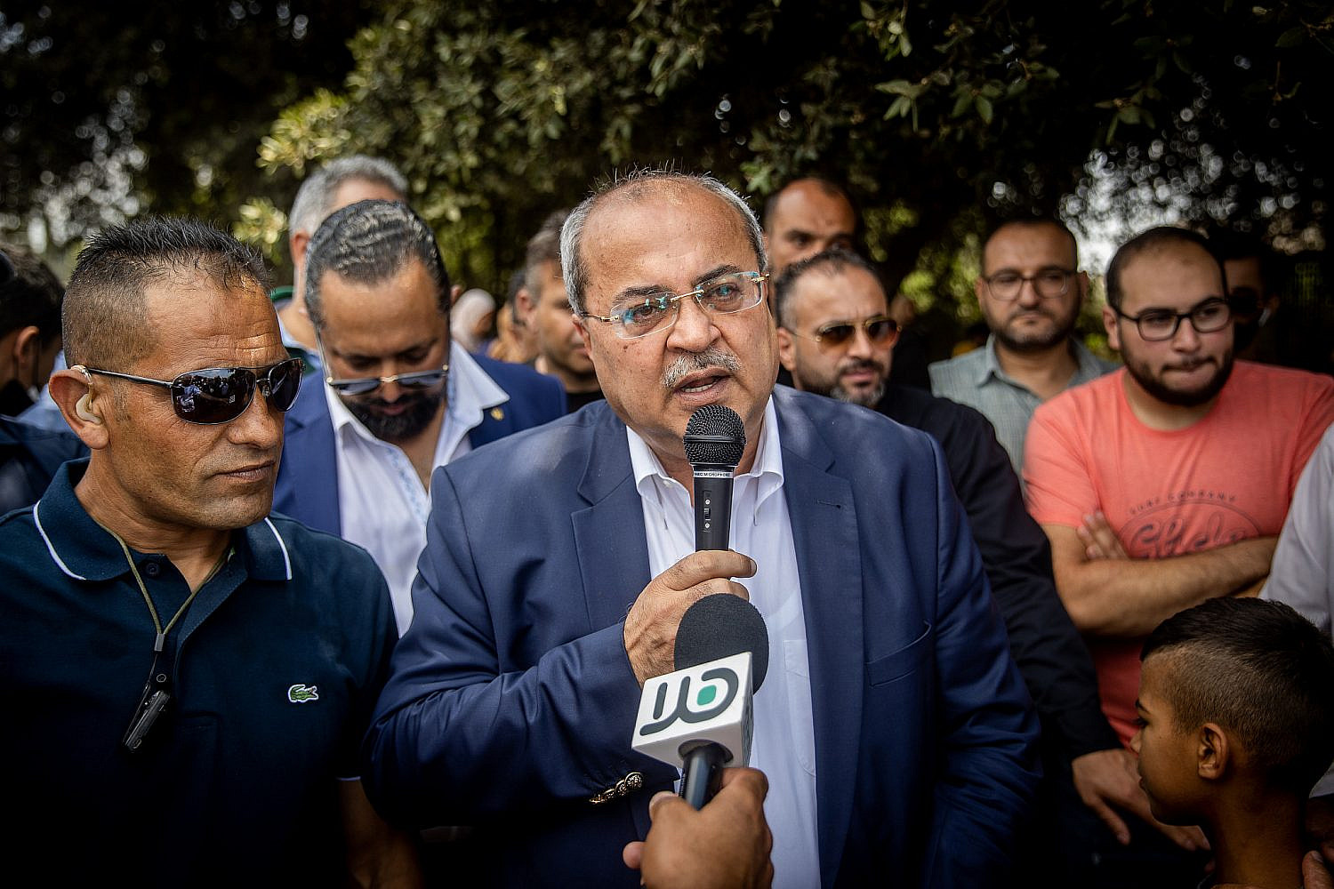 MK Ahmad Tibi speaks during a protest against the Citizenship Law, also known as the Ban on Family Reunification Law, outside the Knesset in Jerusalem, July 5, 2021. (Yonatan Sindel/Flash90)