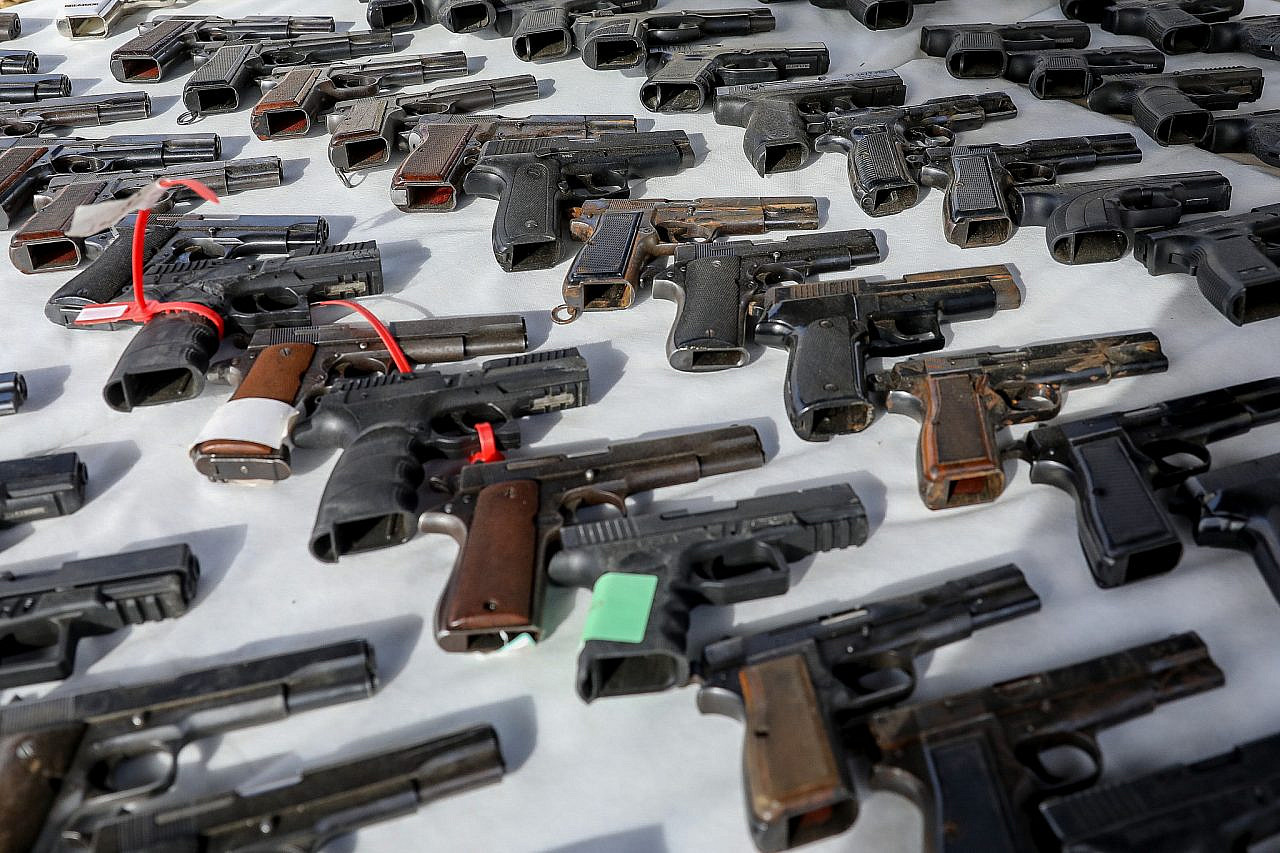 View of seized guns in Rahat, southern Israel, December 6, 2021. (Noam Revkin Fenton/Flash90)