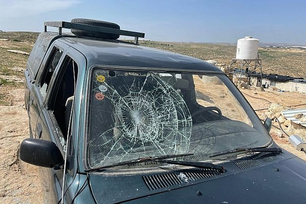 Damaged vehicles following an Israeli settler attack in the Palestinian village of Tuba in the South Hebron Hills, the West Bank, March 30, 2022. (Ali Awad)