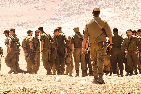 Israeli soldiers during military training between the villages of Al-Mirkez and Jinba in Masafer Yatta, June 22, 2022. (Ali Awad)