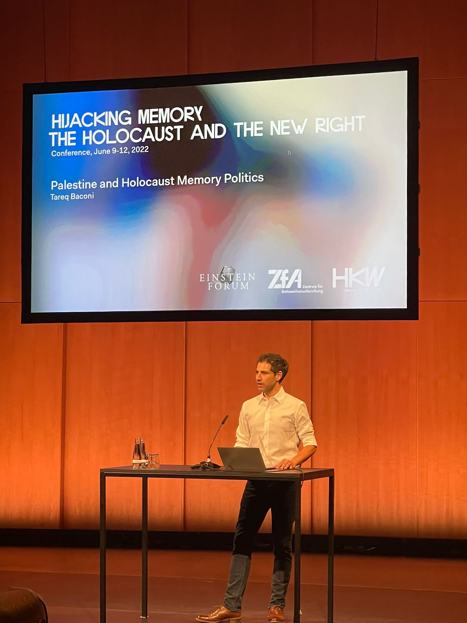 Tareq Baconi, Palestinian analyst and writer, delivering his speech at the Hijacking Memory Conference in Berlin, June 2022. (Emily Hilton)