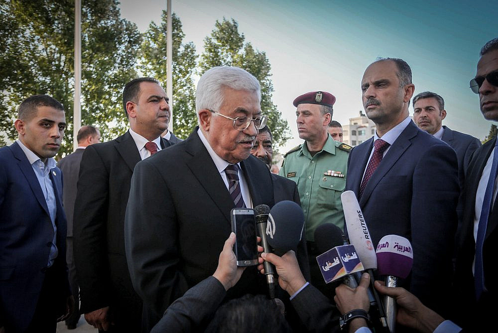 Palestinian President Mahmoud Abbas taking part in a prayer ahead of the Eid al-Fitr holiday marking the end of Ramadan, in Ramallah, West Bank, July 6, 2015. (Flash90)
