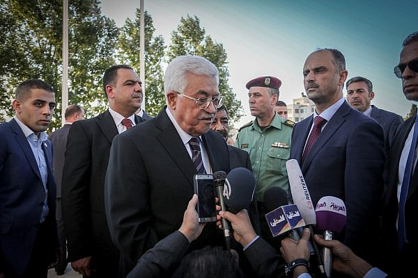 Palestinian President Mahmoud Abbas taking part in a prayer ahead of the Eid al-Fitr holiday marking the end of Ramadan, in Ramallah, West Bank, July 6, 2015. (Flash90)