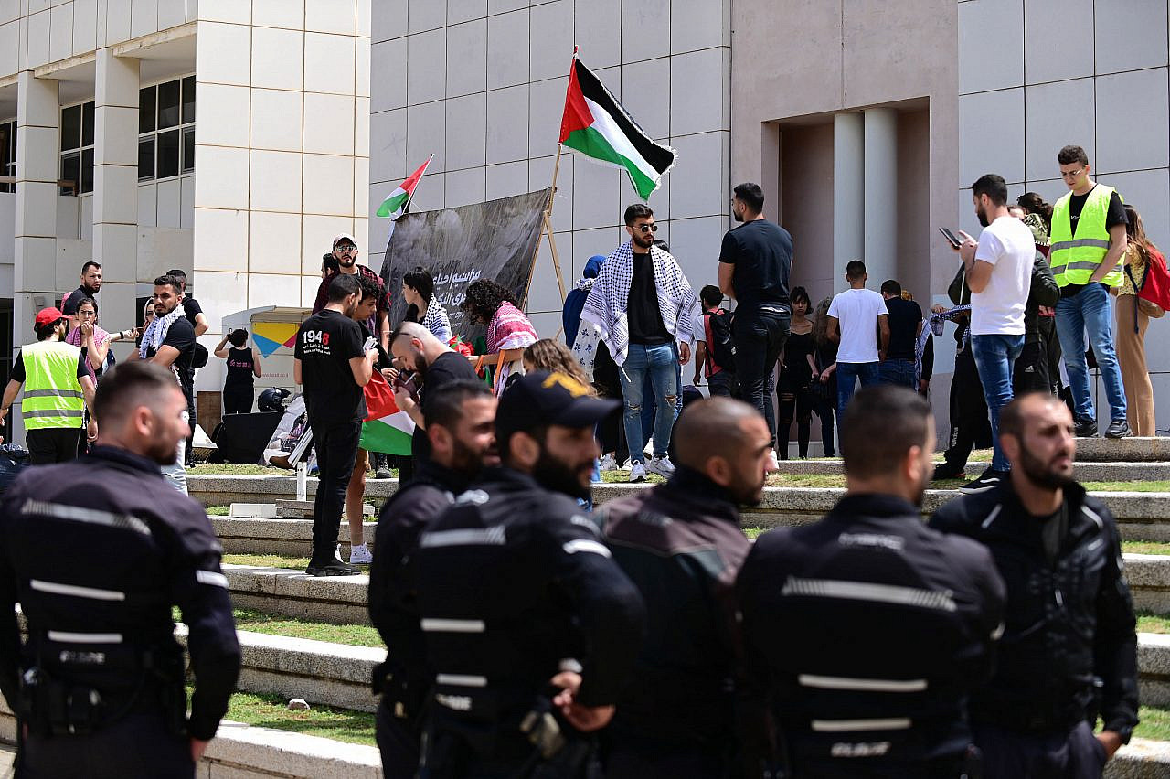 Israeli police watch on as Palestinians hold a Nakba Day event at Tel Aviv University's Entin Square, May 15, 2022. (Tomer Neuberg/Flash90)