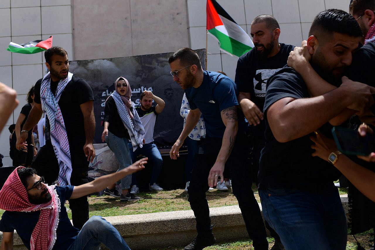 Israeli undercover police officers arrest Palestinian students ahead of a Nakba Day event at Tel Aviv University, May 15, 2022. (Tomer Neuberg/Flash90)