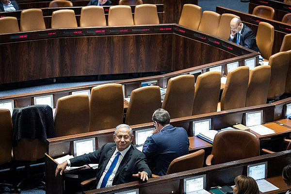Israeli Prime Minister Naftali Bennett and head of the opposition Benjamin Netanyahu at a debate in the Knesset plenum, Jerusalem, June 13, 2022. (Yonatan Sindel/Flash90)