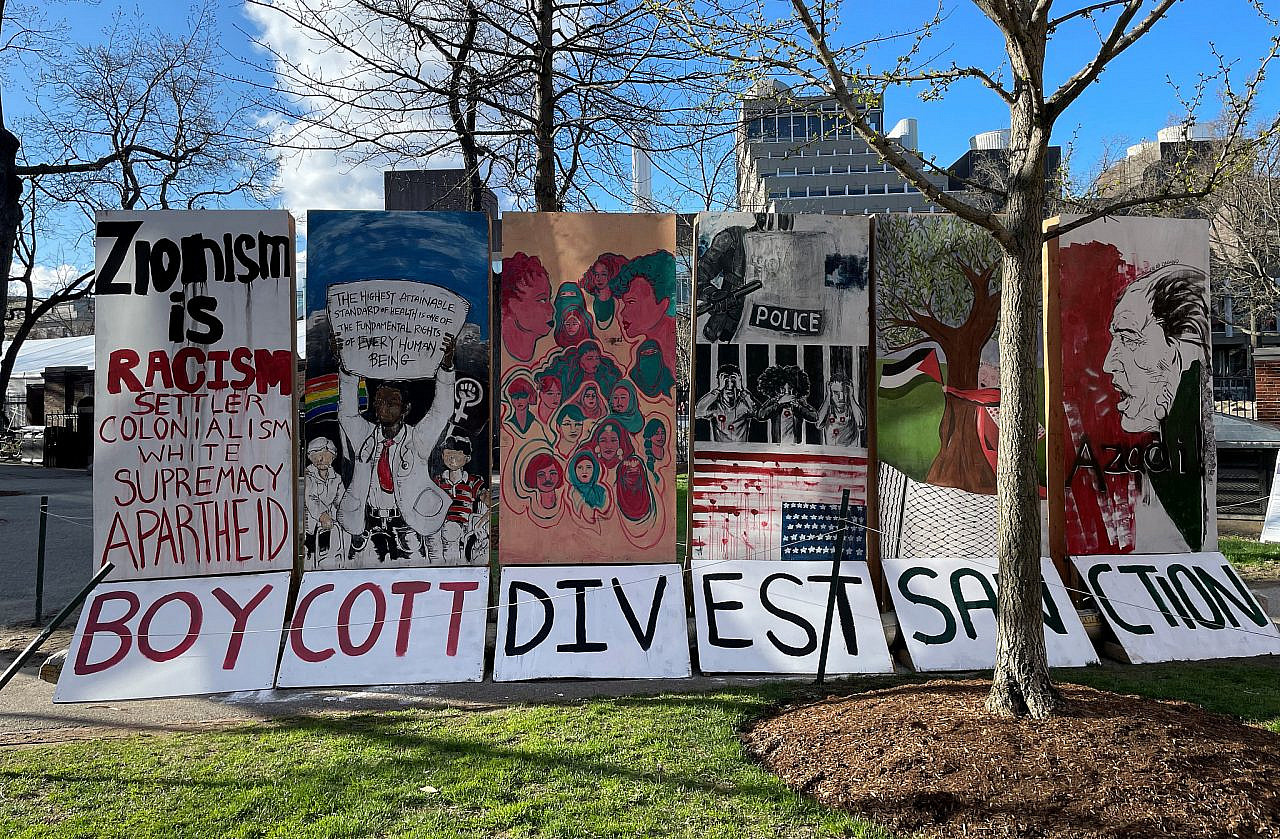 One side of Harvard PSC's "apartheid wall" installation constructed on campus during Israeli Apartheid Week 2022. (Courtesy of Harvard PSC)