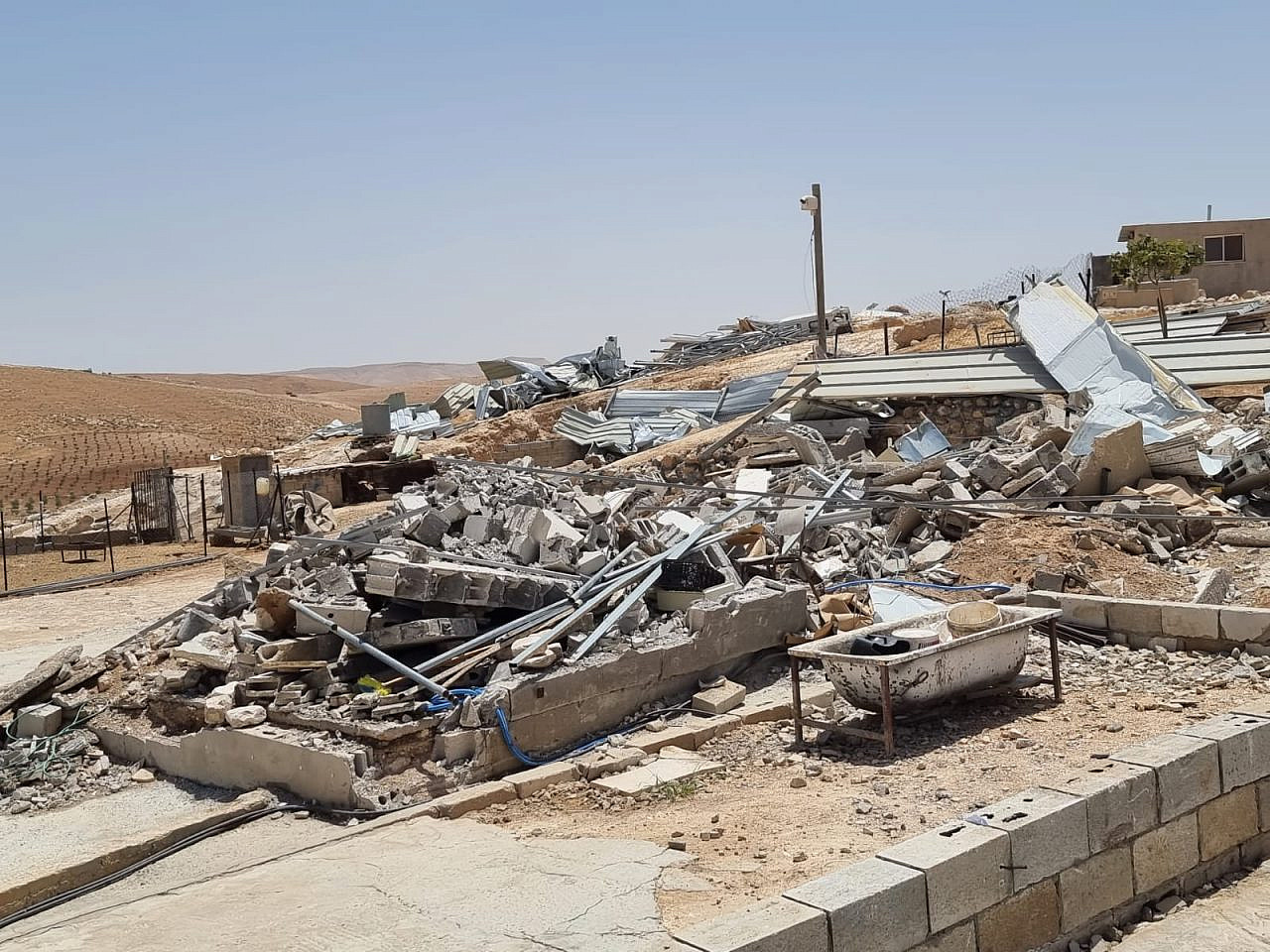 Demolished homes in Masafer Yatta in the occupied West Bank, June 1, 2022. (Yuval Abraham)