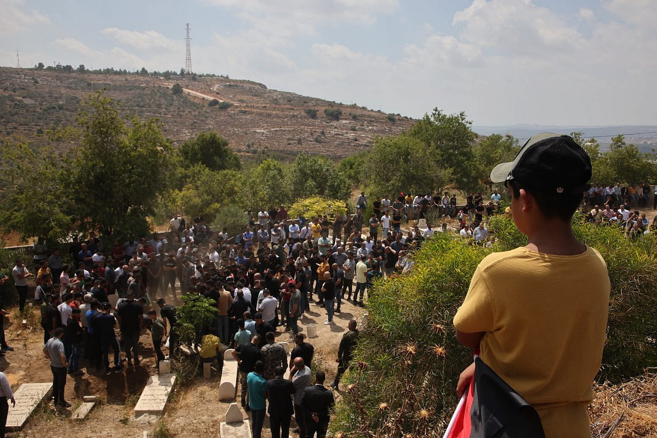 Palestinians take part in the funeral of Ali Hasan Harb, who was stabbed and killed by an Israeli settler, Iskaka, June 22, 2022. (Oren Ziv)