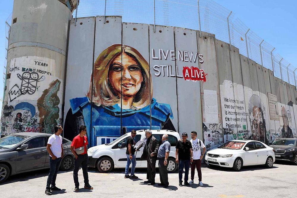 Graffiti of Palestinian journalist Shireen Abu Akleh on the separation wall, in the West Bank city of Bethlehem, July 6, 2022. (Wisam Hashlamoun/Flash90)