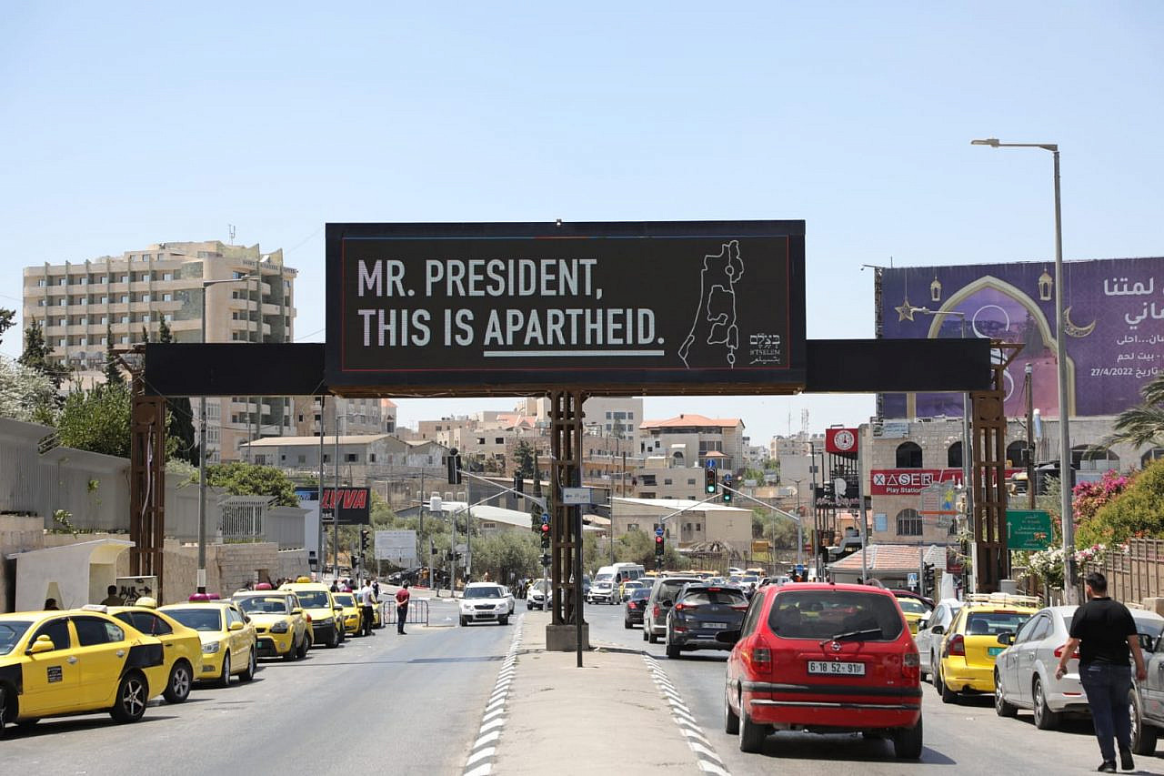 A billboard put up B'Tselem in Bethlehem welcomes Bethlehem President Joe Biden on his visit to the West Bank, July 13, 2022. (Heidi Motola)