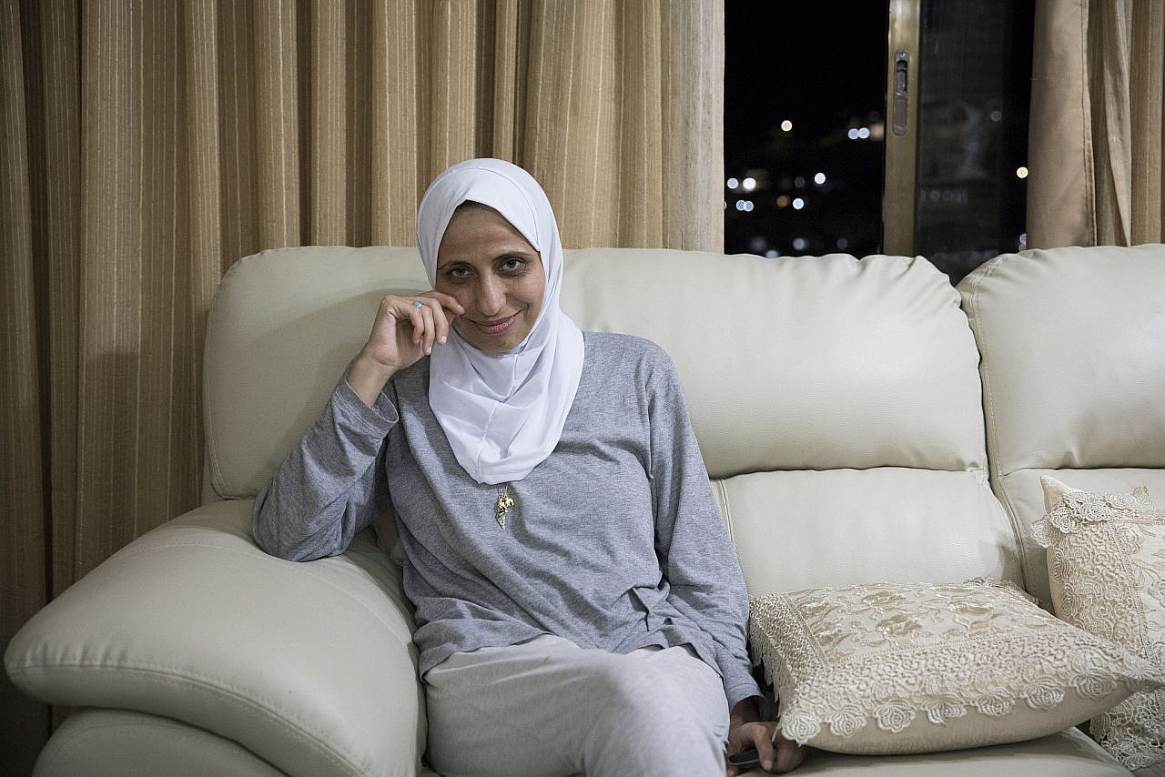 Palestinian poet Dareen Tatour in her home in the town of Reineh, near Nazareth, August 23, 2017. (Oren Ziv)
