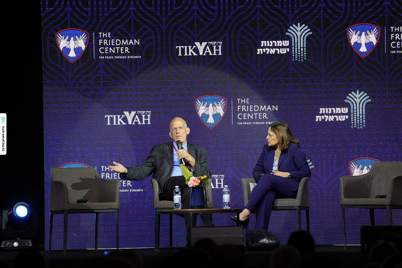 Far-right commentator Caroline Glick (right) interviews Elliott Abrams at the Israeli Conservatism Conference, Jerusalem, May 26, 2022. (Fabian Koldorff)