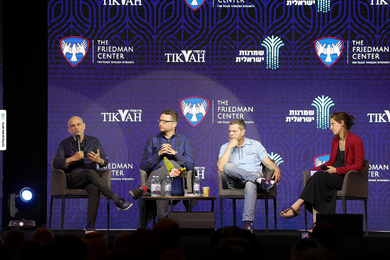 Gadi Taub (from left), Roy Iddan, Shai Golden, and Irit Linur share the stage during a panel on Israeli culture, at the annual Israeli Conservatism Conference, Jerusalem, May 26, 2022. (Fabian Koldorff)
