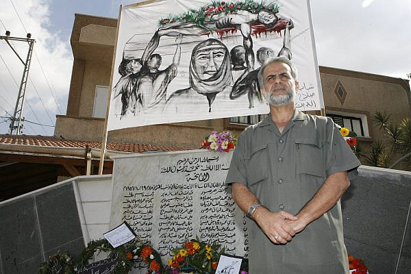 Knesset Member Ibrahim Sarsur stands by a monument for the victims of the Kafr Qasem massacre, October 28, 2007. (Michal Fattal/Flash90)