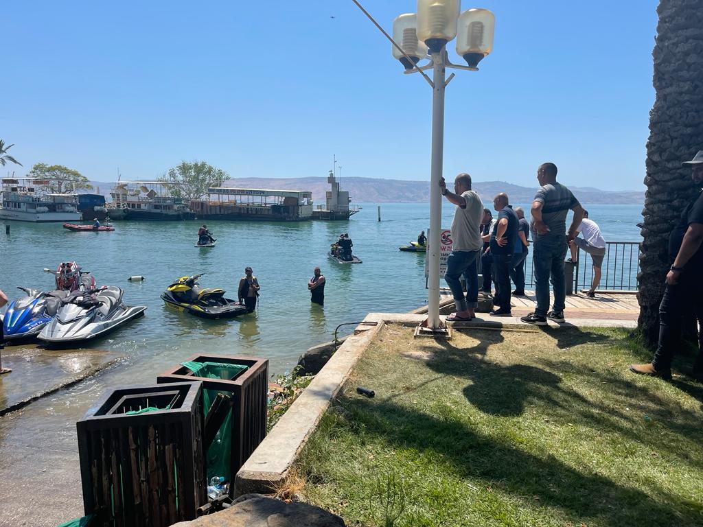 Palestinian citizens carrying out a search for the body of Raed Mahamid after he drowned in Lake Tiberias, July 2022. (Courtesy of Rashad Omary)