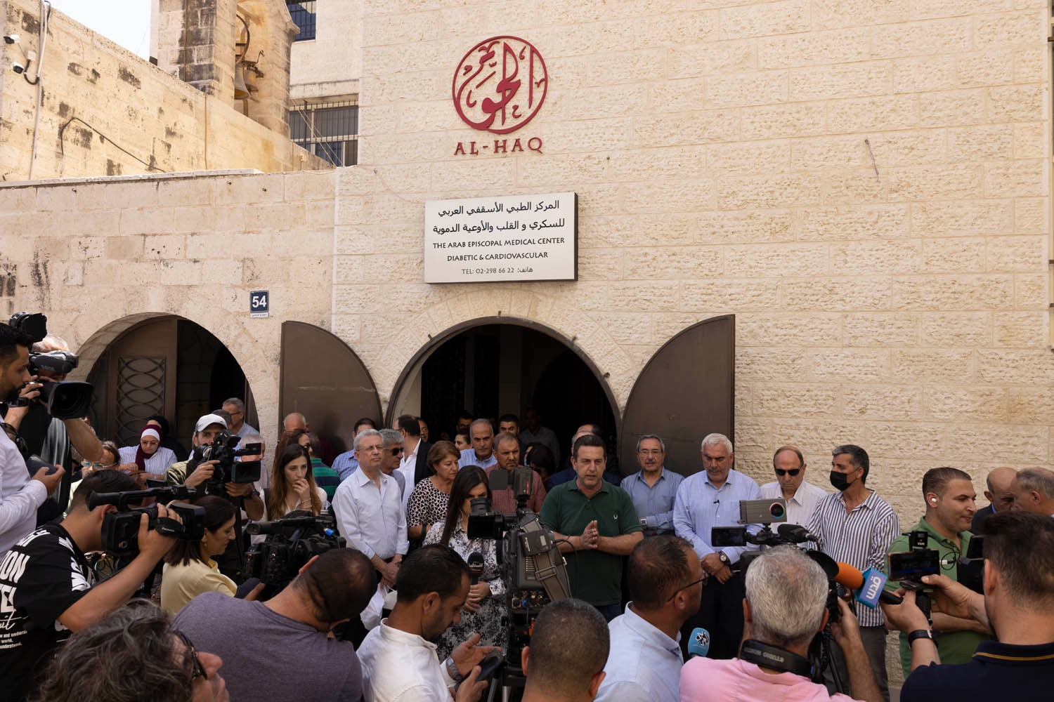 Heads of Palestinian NGOs speak to the media outside of Al-Haq's offices after the Israeli army raided their offices, Ramallah, West Bank, August 18, 2022. (Oren Ziv)