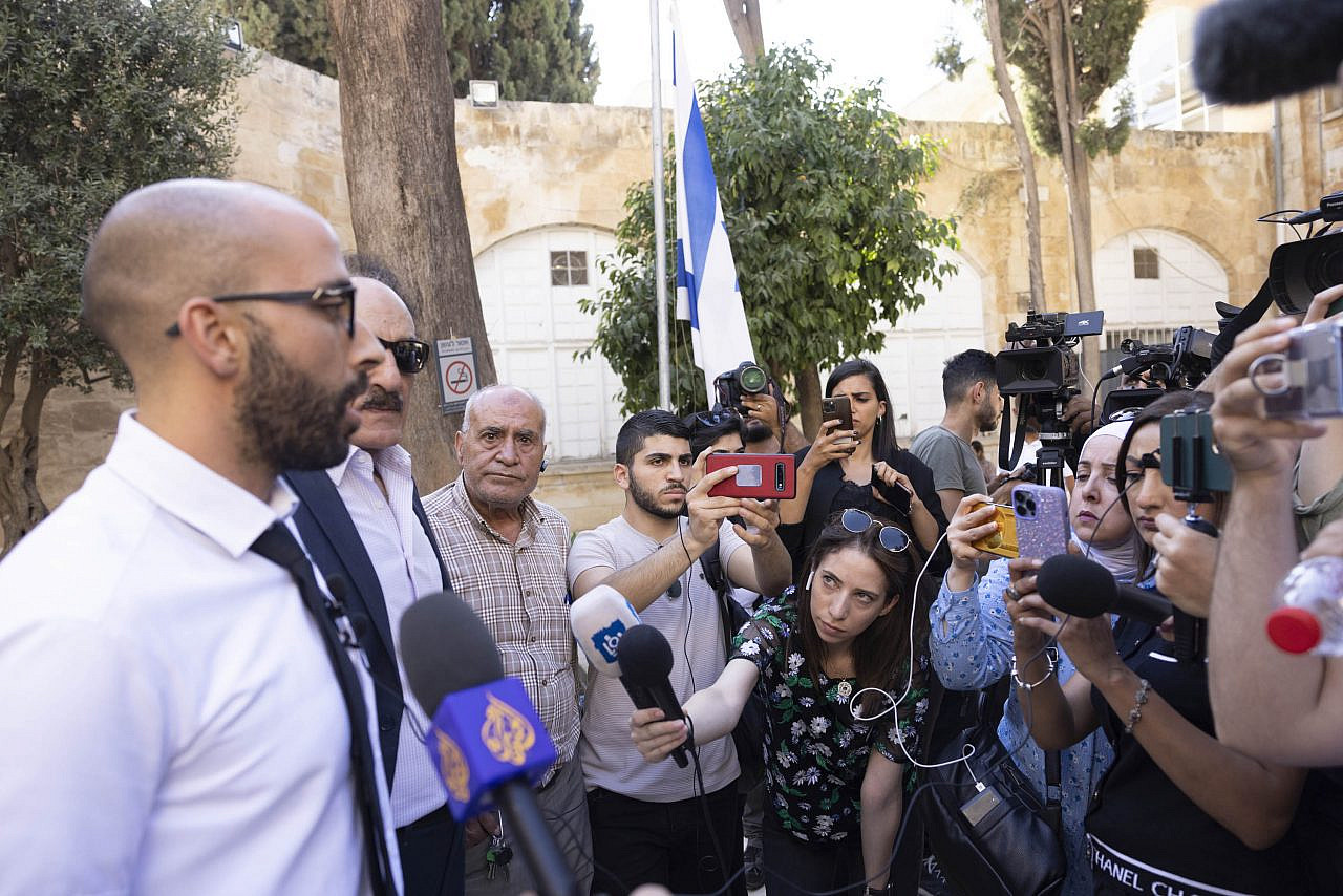 Nasser Odeh, Lama Ghosheh’s attorney, speaks to reporters following Ghosheh's hearing at the Jerusalem Magistrate's Court, September 12, 2022. (Oren Ziv)