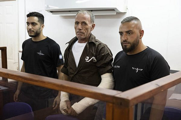 Hafez Hureini (center) during a hearing in Ofer Military Court, September 19, 2022. (Oren Ziv)