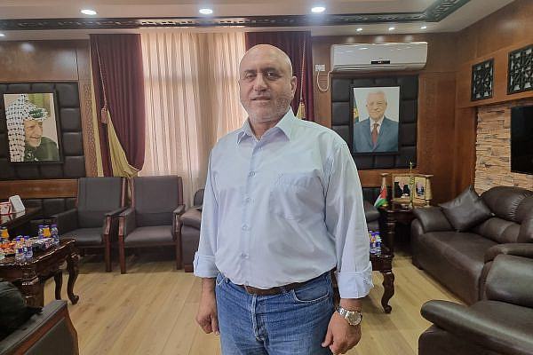 Jenin governor Akram Rajoub in his office, West Bank, September 2022. (Yuval Abraham)