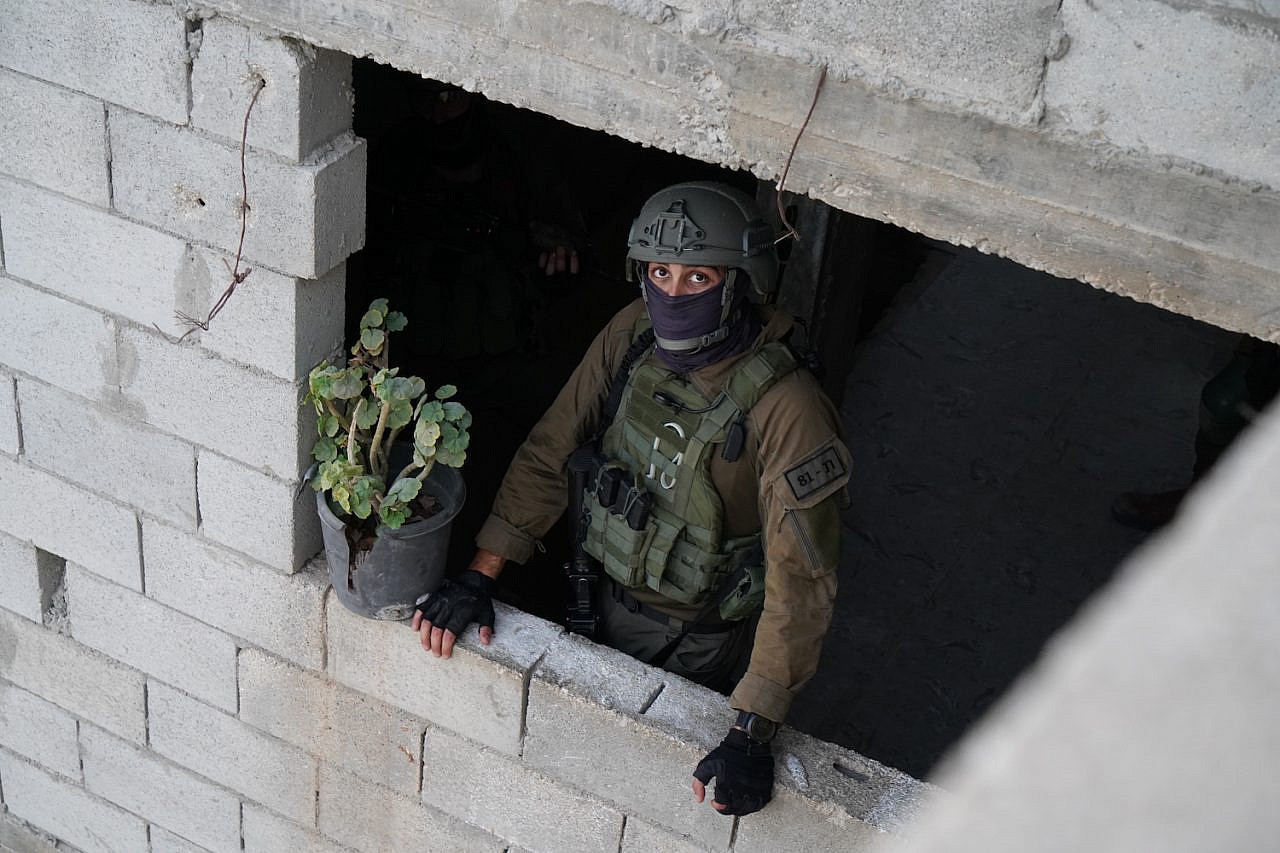 An Israeli soldier seen during a raid on the village of A-Tuwani in the South Hebron Hills, September 15, 2022. (Omri Eran-Vardi)