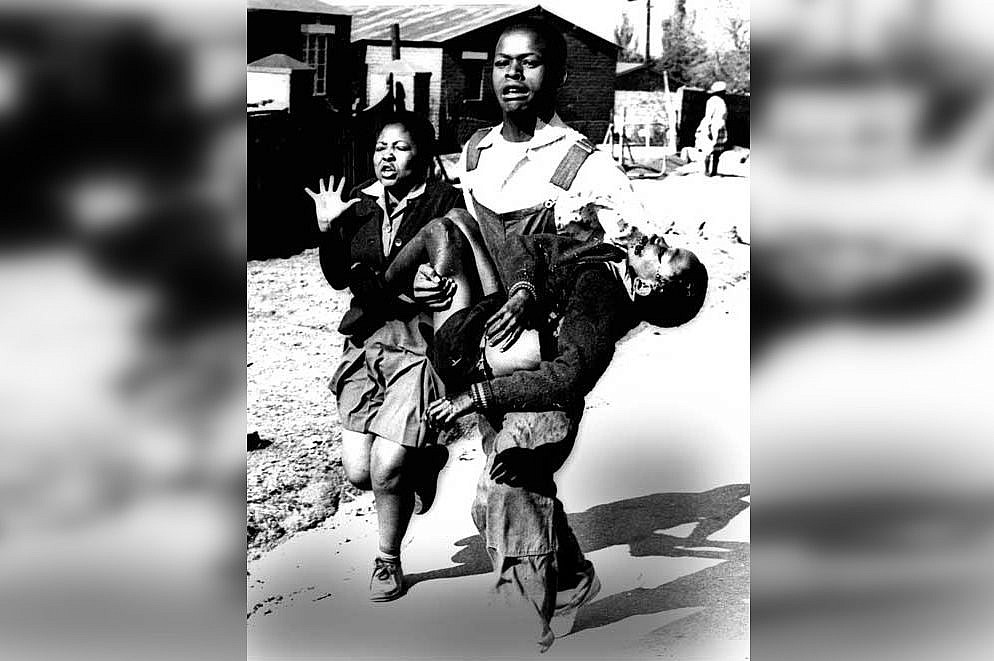 A famous photo from the Soweto Uprising of June 16-18, 1976, showing Hector Pieterson being carried by Mbuyisa Makhubo after being shot by the South African police. His sister, Antoinette Sithole, runs beside them. Pieterson was rushed to a local clinic where he was declared dead on arrival. (Sam Nzima/CC BY-SA 2.0)