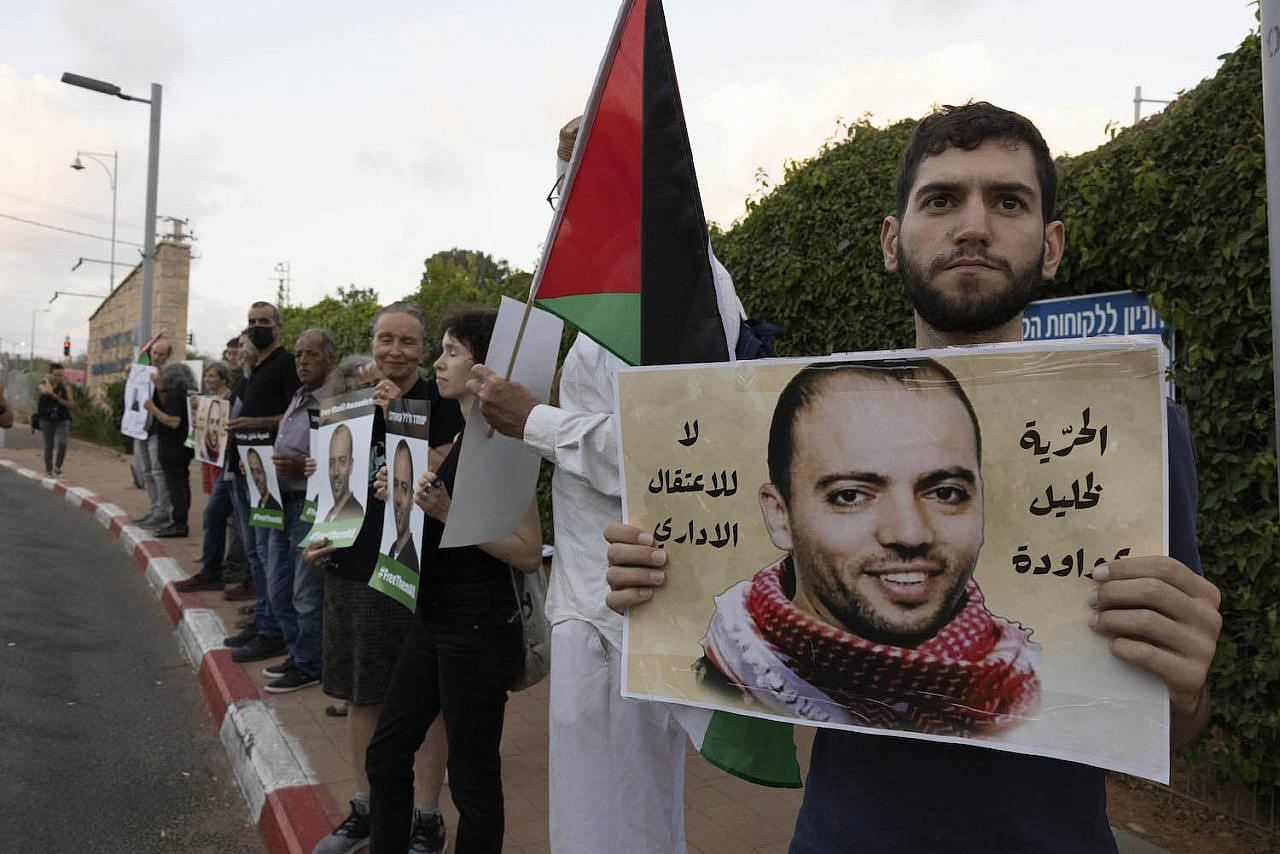 Activists protest outside Shamir Medical Center in solidarity with Khalil Awawdeh, a Palestinian prisoner held in administrative detention who is currently on hunger strike for more than 170 days, August 13, 2022. (Oren Ziv)