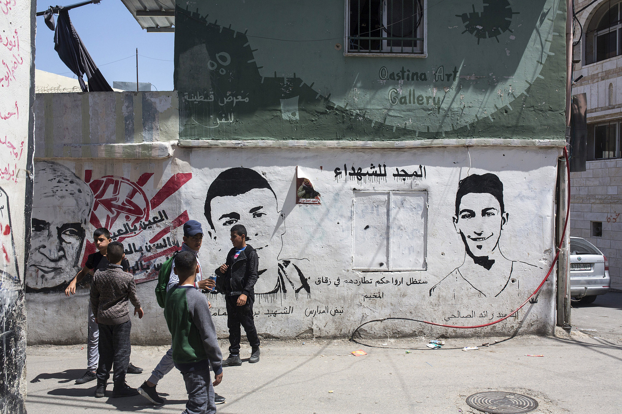 Murals commemorating martyrs in Dheisheh refugee camp, Bethlehem, West Bank, April 29, 2018. (Activestills)