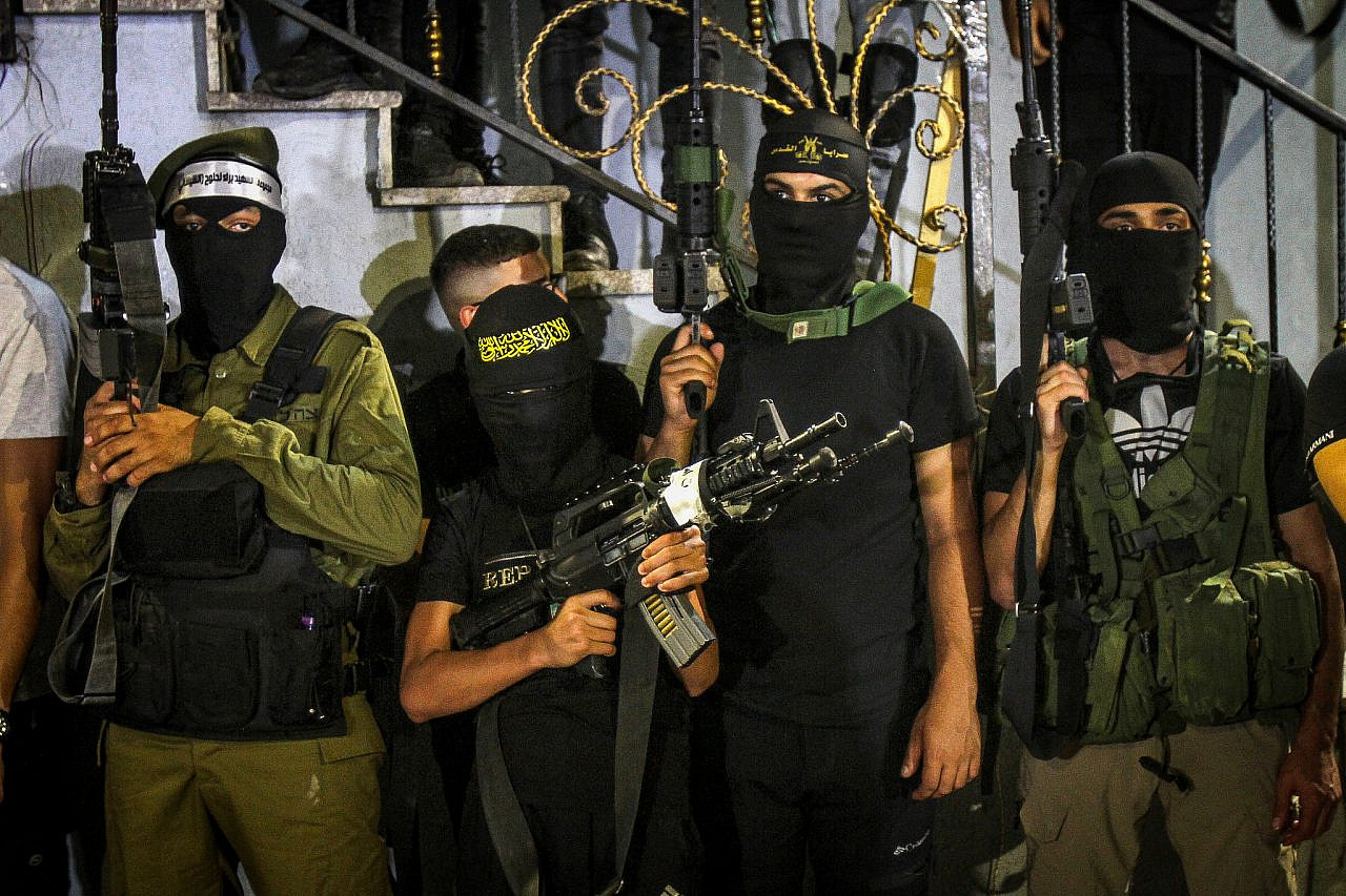 Armed Palestinian gunmen take part in a military parade, Jenin refugee camp, occupied West Bank, June 19, 2022. (Nasser Ishtayeh/Flash90)