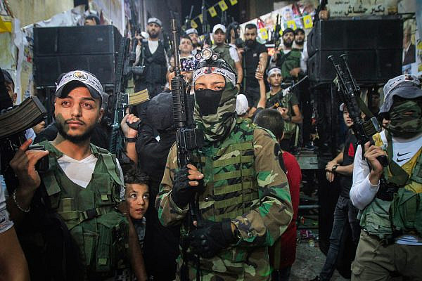 Palestinian gunmen from Al-Aqsa Martyrs' Brigades seen during a military parade in Balata Refugee Camp, West Bank, September 21, 2022. (Nasser Ishtayeh/Flash90)