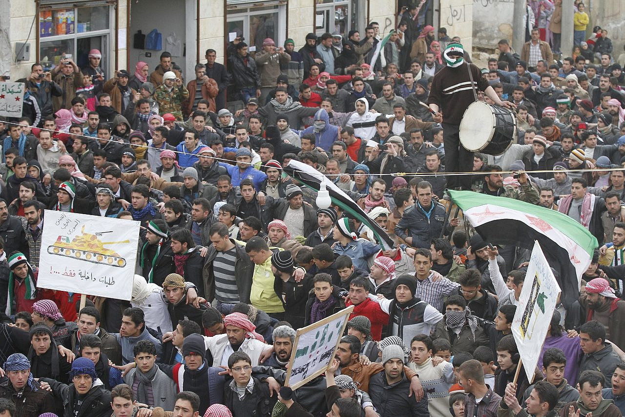 Demonstrators protest against Syria's President Bashar al-Assad in Idlib, northern Syria, February 6, 2012. (Nasser Nouri/CC BY-NC-SA 2.0)